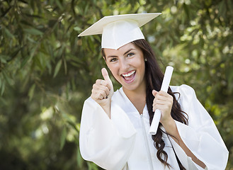 Image showing Graduating Mixed Race Girl In Cap and Gown with Diploma