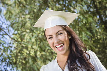 Image showing Happy Graduating Mixed Race Girl In Cap and Gown