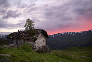 Image showing Old abandoned hut with sunset view