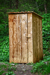 Image showing Rustic wooden toilet in the forest