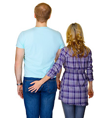 Image showing Young couple - rear view on white