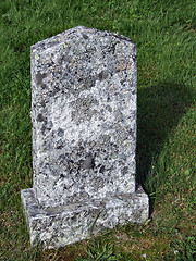 Image showing Old tombstone in a graveyard