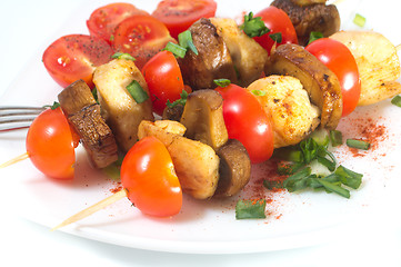 Image showing Roasted chicken with mushrooms and tomatoes 