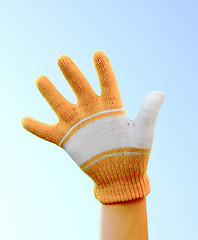 Image showing One hand dressed in a glove