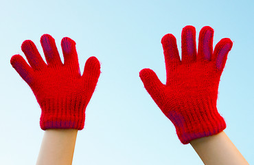 Image showing Two hands dressed in gloves