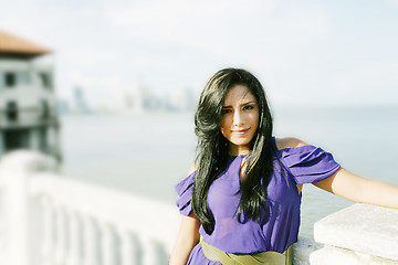 Image showing Beautiful lady posing in the beginning of the coast