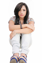 Image showing Depressed teenage girl, isolated on white