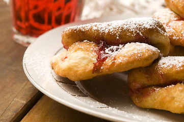 Image showing Dough with marmelade on wooden board