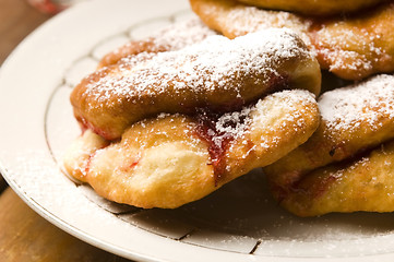 Image showing Dough with marmelade on wooden board