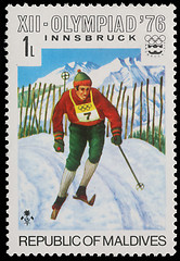 Image showing Stamp printed by Maldives, shows Alpine skiing at the Winter Olympics in Innsbruck