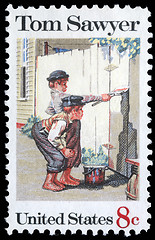 Image showing Stamp printed in USA shows the painting Tom Sawyer