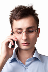 Image showing Young businessman talking on the mobile phone