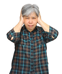 Image showing asian mature woman closing ears with hands