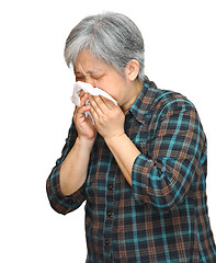 Image showing sneezing mature asian woman