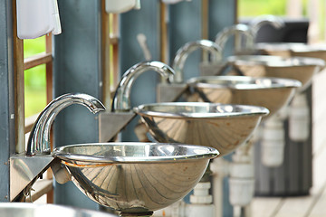 Image showing sinks and taps outdoor