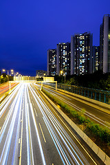 Image showing traffic with blur light through city at night