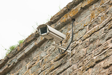 Image showing Video camera of system of supervision on a building wall 