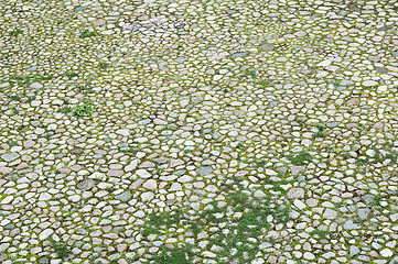 Image showing The top view on a cobblestone road