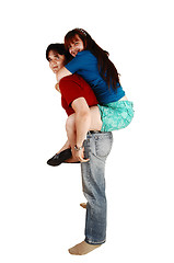 Image showing A piggy back couple.