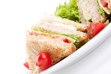 Image showing fresh tasty club sandwich with salad and toast isolated