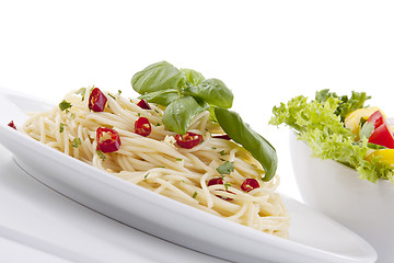 Image showing fresh pasta with chilli and basil isolated