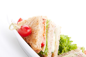 Image showing fresh tasty club sandwich with salad and toast isolated