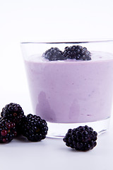 Image showing fresh tasty blackberry yoghurt shake dessert isolated