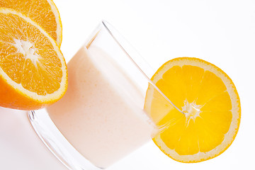 Image showing fresh tasty orange yoghurt shake dessert isolated