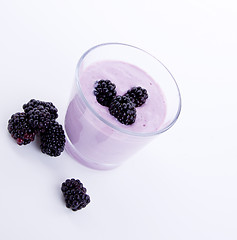 Image showing fresh tasty blackberry yoghurt shake dessert isolated