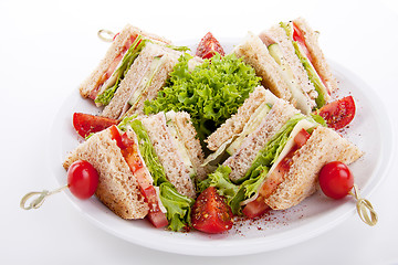 Image showing fresh tasty club sandwich with salad and toast isolated