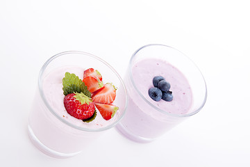 Image showing fresh tasty strawberry blueberry yoghurt shake cream isolated