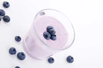 Image showing tasty fresh blueberry yoghurt shake dessert isolated