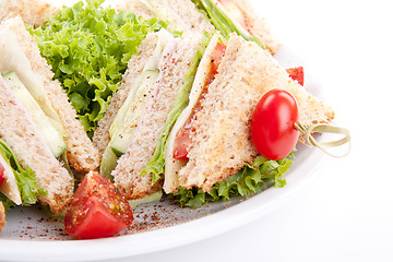 Image showing fresh tasty club sandwich with salad and toast isolated