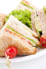 Image showing fresh tasty club sandwich with salad and toast isolated