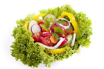 Image showing fresh tasty mixed salad with different vegetables isolated