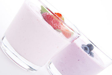 Image showing fresh tasty strawberry blueberry yoghurt shake cream isolated