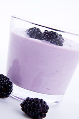 Image showing fresh tasty blackberry yoghurt shake dessert isolated