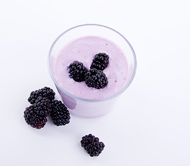 Image showing fresh tasty blackberry yoghurt shake dessert isolated