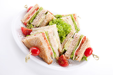 Image showing fresh tasty club sandwich with salad and toast isolated