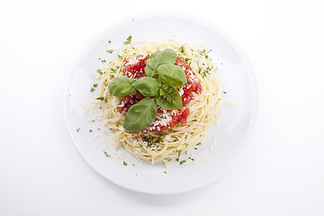 Image showing tatsty fresh spaghetti with tomato sauce and parmesan isolated