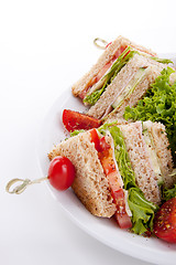 Image showing fresh tasty club sandwich with salad and toast isolated