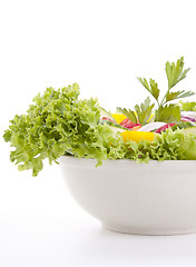 Image showing fresh tasty mixed salad with different vegetables isolated