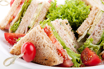 Image showing fresh tasty club sandwich with salad and toast isolated