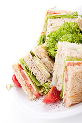 Image showing fresh tasty club sandwich with salad and toast isolated