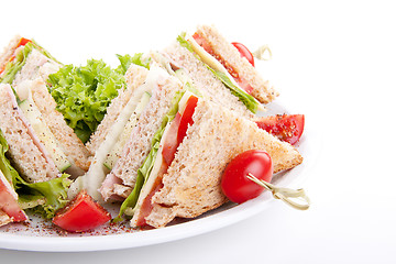 Image showing fresh tasty club sandwich with salad and toast isolated