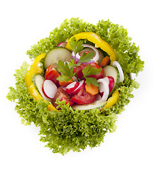 Image showing fresh tasty mixed salad with different vegetables isolated