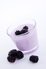 Image showing fresh tasty blackberry yoghurt shake dessert isolated