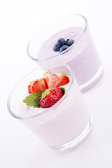 Image showing fresh tasty strawberry blueberry yoghurt shake cream isolated