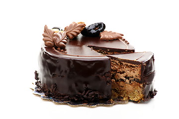 Image showing Chocolate cake with walnuts and prunes.