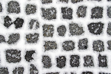 Image showing Snowy granite pavement